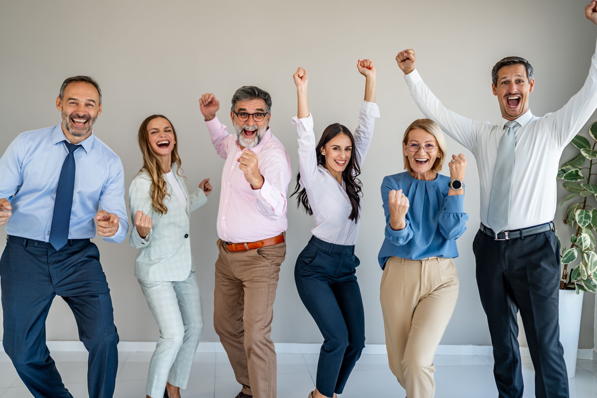 Business people celebrating success and achieving goals